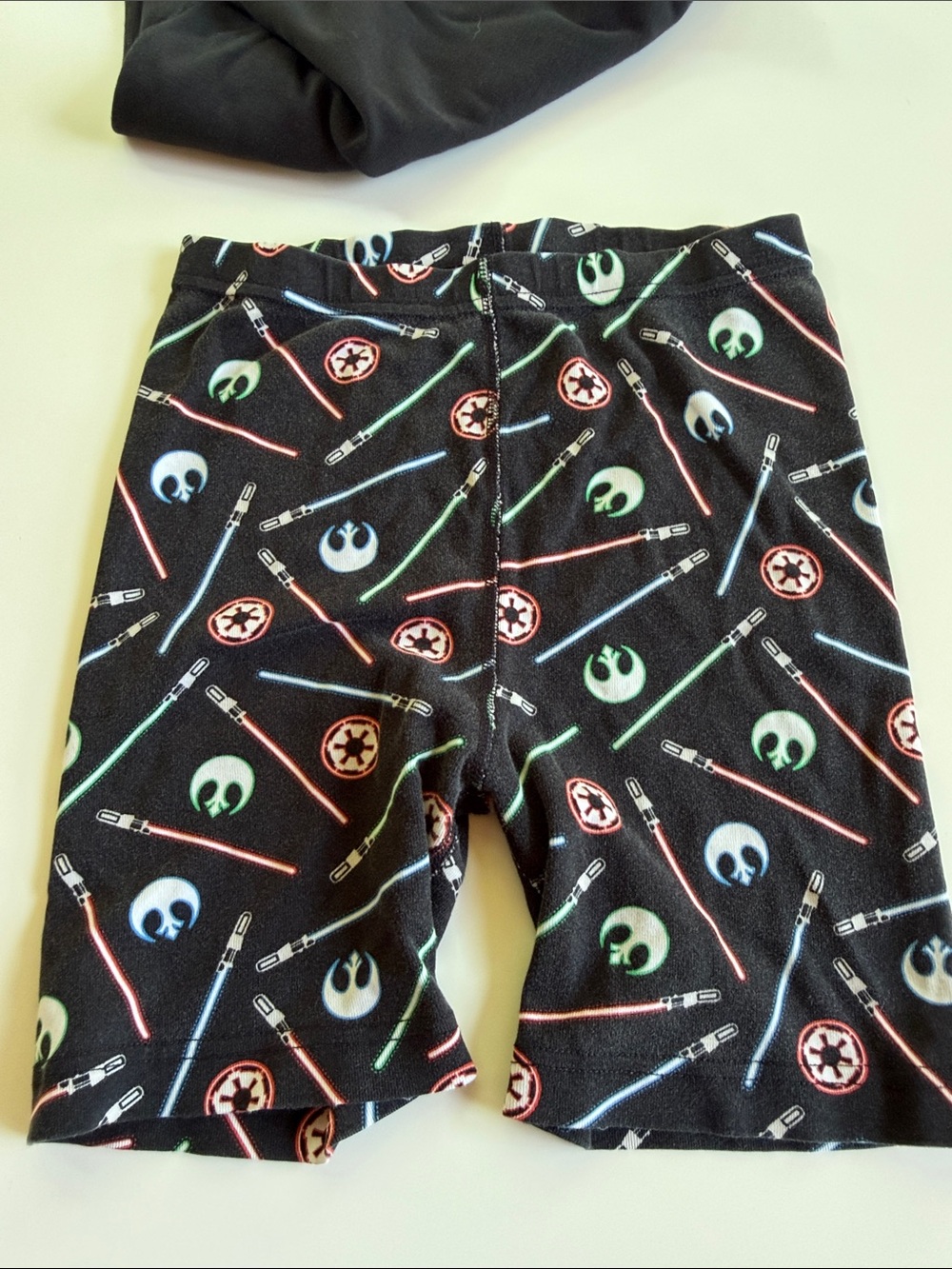 Hanna Andersson Black Pajama Set with Red, Green & Blue Lightsaber Graphics - Picture 5 of 5